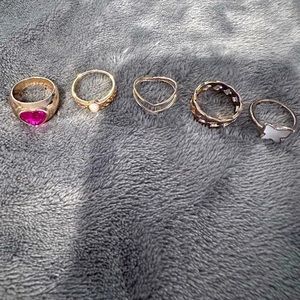 Assorted gold colored rings